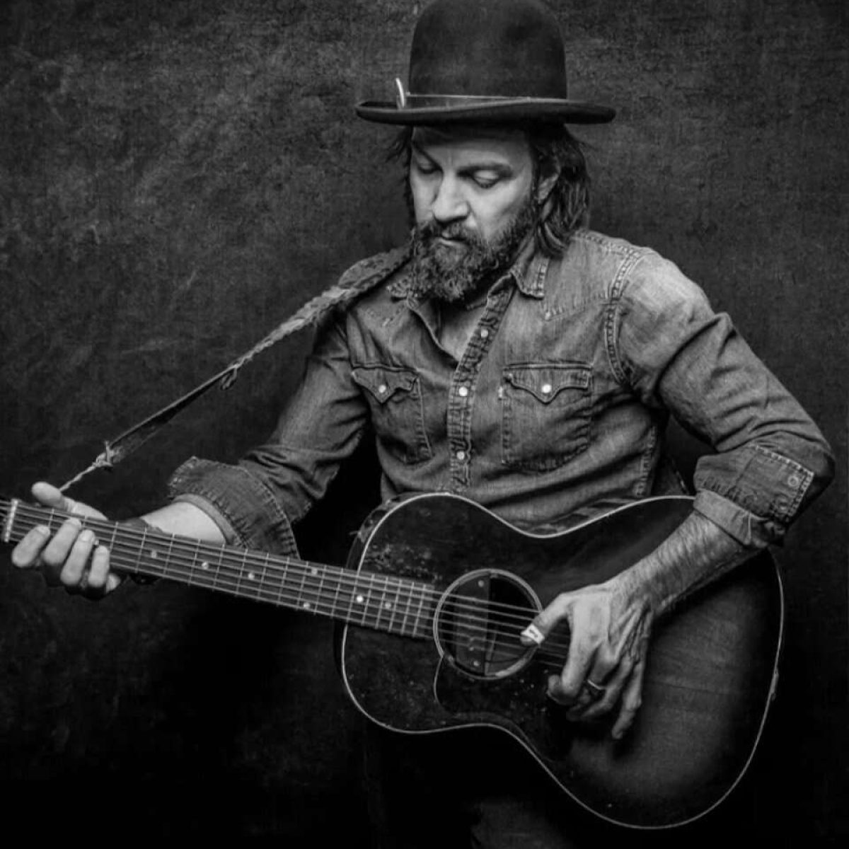 man playing guitar